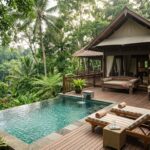 A luxurious tented villa with a private plunge pool, surrounded by dense jungle foliage in Ubud.