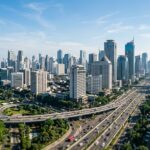 Top 10 Must-Visit Attractions in Jakarta (2025 Guide) A wide view of the Jakarta skyline with modern high-rise buildings and a clear sky.