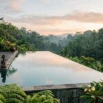 Luxury Accommodation in Ubud, Bali: The Ultimate 2026 Guide Infinity pool overlooking a lush Balinese jungle valley at sunrise.